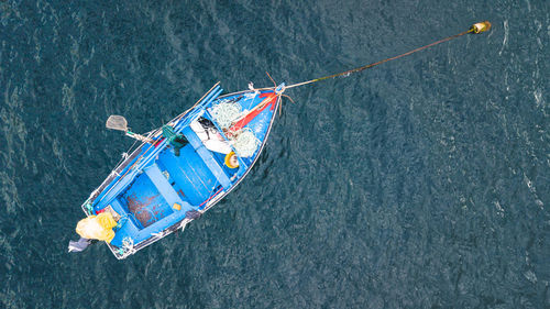 High angle view of fishing boat moored in sea