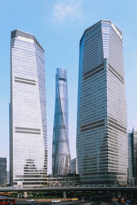 Low angle view of modern buildings against sky