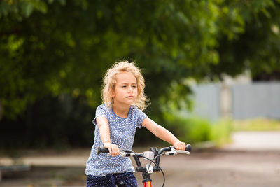 Portrait of a girl riding bicycle
