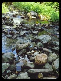 Stream flowing through rocks