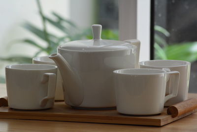 Close-up of coffee cup on table