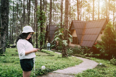 Side view of senior man in forest