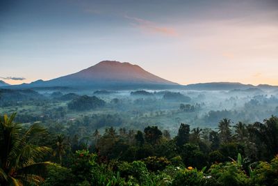 Scenic view of mountains against sky during sunset