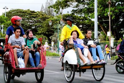 Portrait of people riding motorcycle