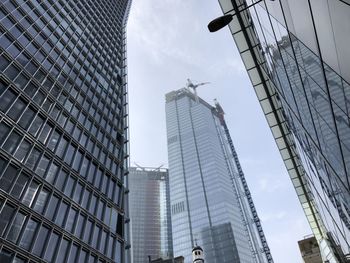 Low angle view of modern buildings in city