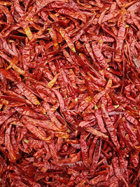 Full frame shot of red chili peppers at market