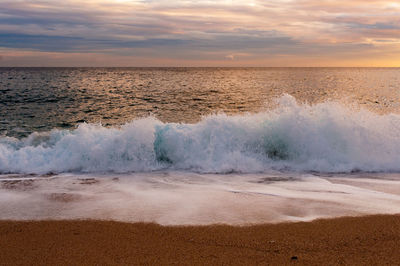 Waves splashing on beach