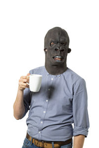 Man holding coffee cup against white background