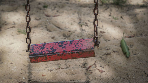 Old empty swing at playground