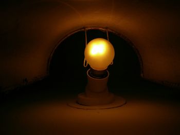 Low angle view of illuminated lamp