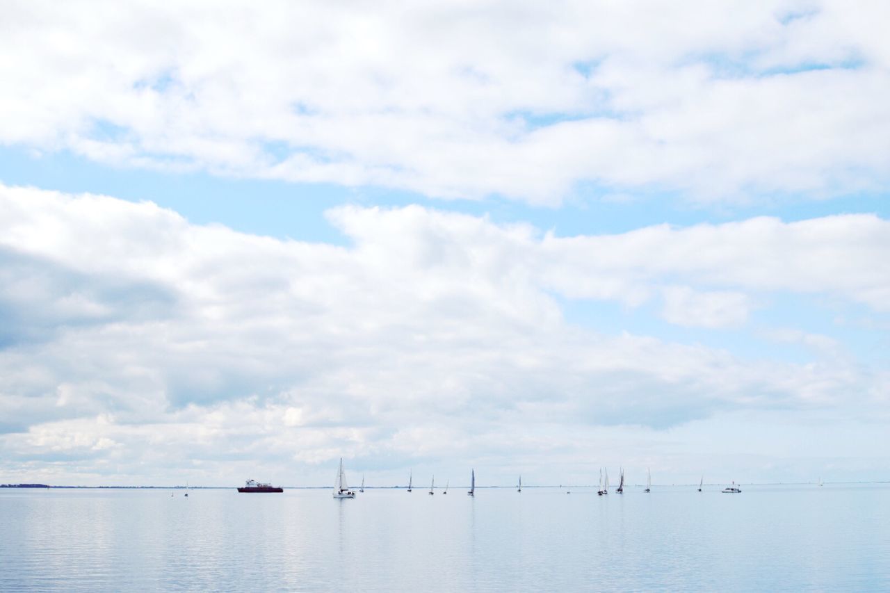 SAILBOATS ON SEA AGAINST SKY