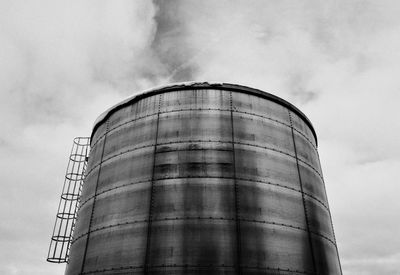 Low angle view of water tower against sky