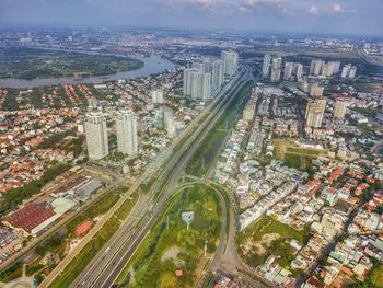 High angle view of street amidst buildings in city