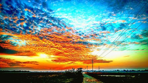 Scenic view of dramatic sky during sunset