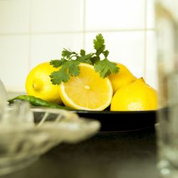 Close-up of fruits in plate on table