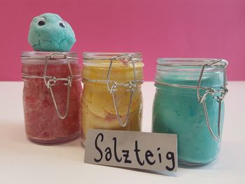 Close-up of drink in glass jar on table