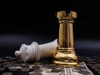 Close-up of chess pieces on table