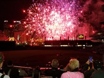 Firework display at night