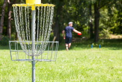 Man playing disc golf in the park