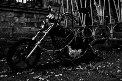 Bicycles parked against wall