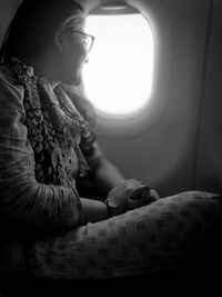 Woman traveling in airplane