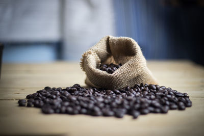 Close-up of coffee beans on table