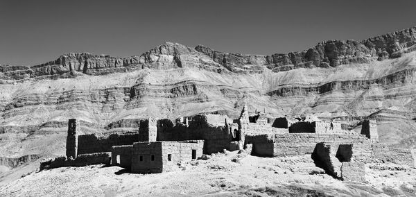 Panoramic view of landscape and mountains against clear sky