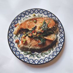 High angle view of fish in plate on table