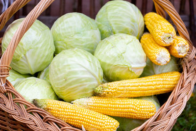 High angle view of vegetables in basket at market stall