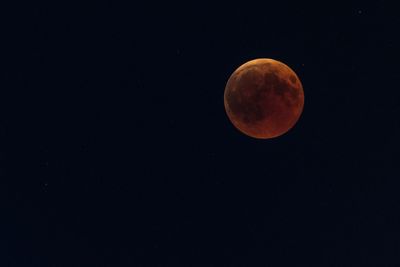 Scenic view of moon against sky at night