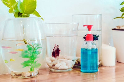 Close-up of drink in glass jar on table