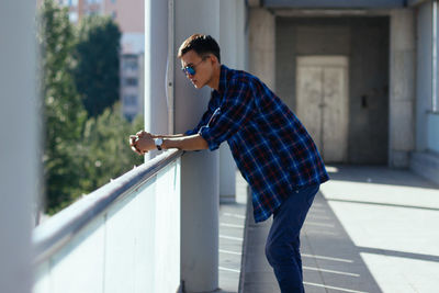 Side view of man standing outdoors