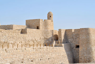 Old ruin building against clear sky