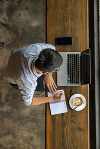 Directly above view of coffee cup on table