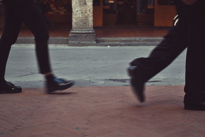 Low section of men on floor