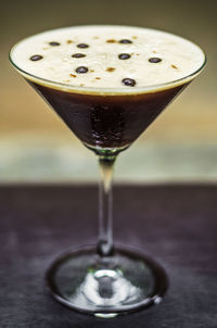 Close-up of wineglass on table