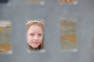 Close-up portrait of smiling girl