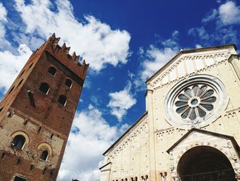 Low angle view of clock tower against sky