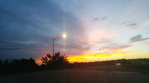 Empty road at sunset