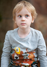 Portrait of cute boy with toy