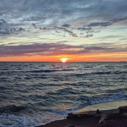 Scenic view of sea against sky during sunset