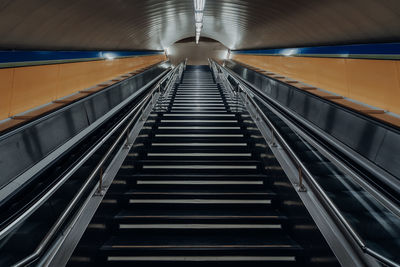 Stairs from metro station leading up to street, empty by covid19.