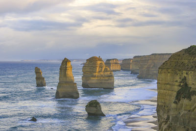 Scenic view of the twelve apostles against cloudy sky