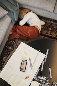 Girl during occupational therapy lying on floor