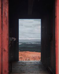 View of sea through window