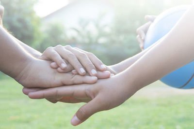 Close-up of hand holding hands