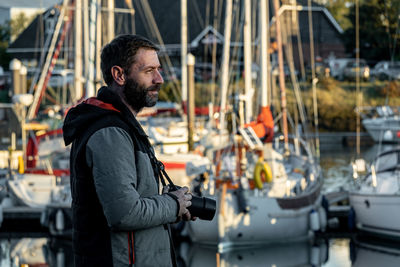 Man photographing boats