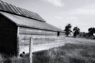 House on field against sky