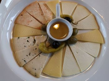 High angle view of cheese in bowl on table