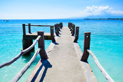 Scenic view of sea against blue sky